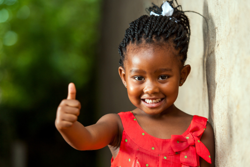 Portrait,Of,Happy,Little,African,Girl,Doing,Thumbs,Up,Sign